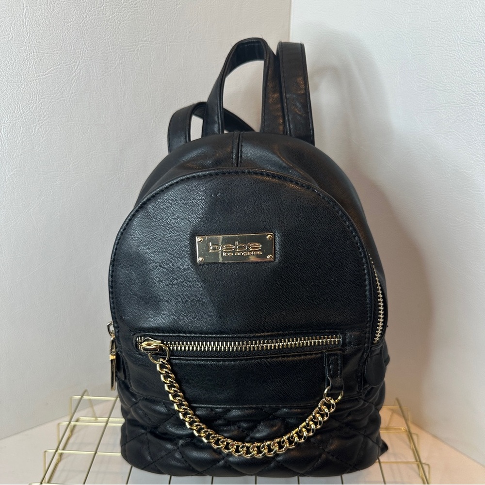 BEBE Black Faux Leather Quilted Mini Backpack Purse with Gold Chain Accent